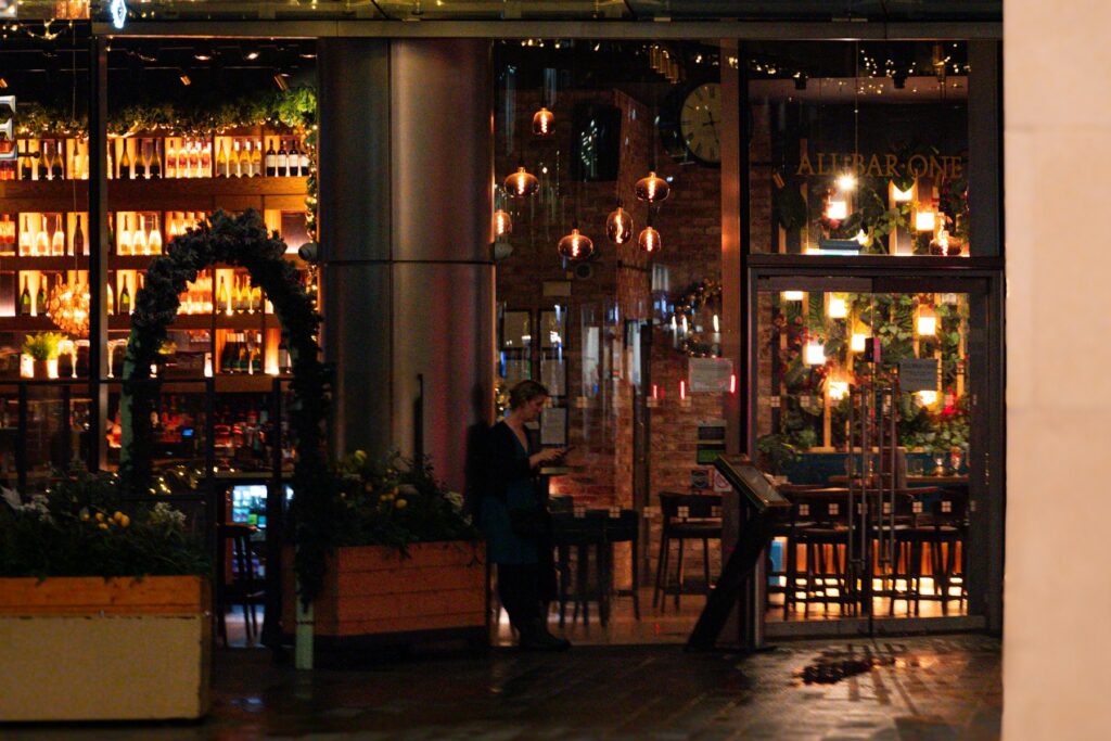 A warmly lit restaurant at night