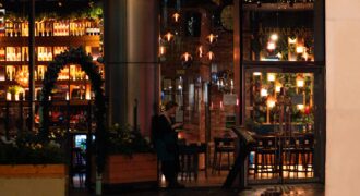 A warmly lit restaurant at night