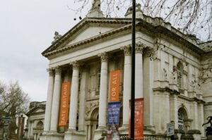 The columned entrance of Tate Britain with banners